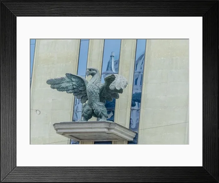 Framed Print : Concrete eagle on the facade of a gray building; Tbilisi, Georgia Framed Print : Concrete eagle on the facade of a gray building; Tbilisi, Georgia