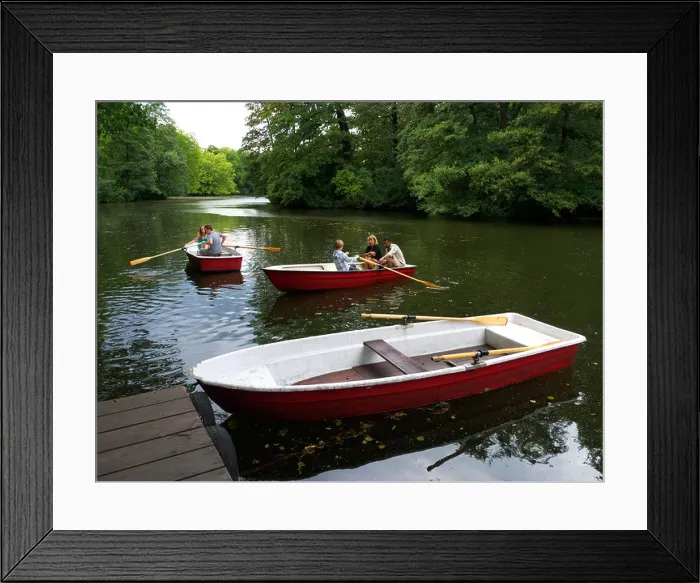 Framed Print : People rowing boats in lake at Tiergarten park in Berlin Germany Framed Print : People rowing boats in lake at Tiergarten park in Berlin Germany