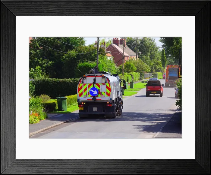 Framed Print : road sweeping lorry cleaning roadside gutters in street ellerton yorkshire united kingdom Framed Print : road sweeping lorry cleaning roadside gutters in street ellerton yorkshire united kingdom
