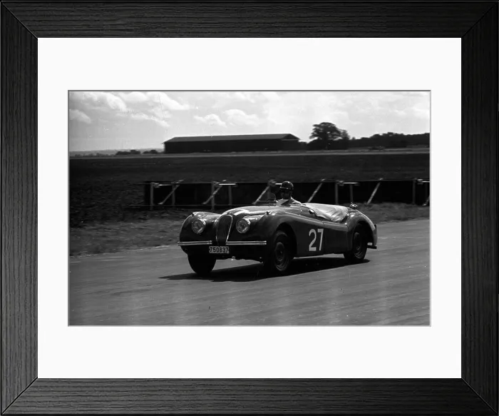 Framed Print : A Jaguar XK120 racing in the International Trophy at Silverstone, England 1950 Framed Print : A Jaguar XK120 racing in the International Trophy at Silverstone, England 1950