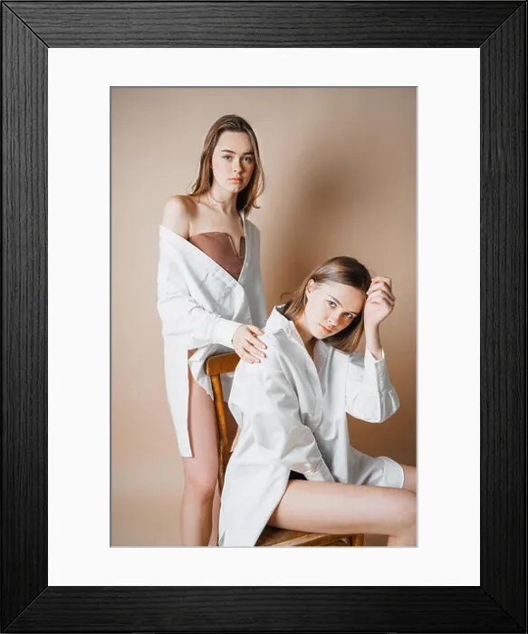 Framed Print : Fashion models two sisters twins beautiful nude girls looking at the camera isolated on beige background Framed Print : Fashion models two sisters twins beautiful nude girls looking at the camera isolated on beige background