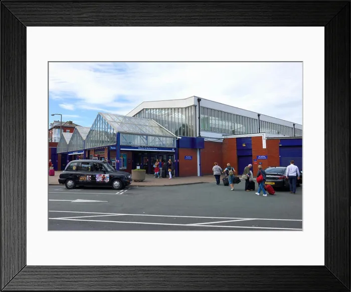 Framed Print : Black taxi outside the front entrance of Blackpool North Railway Station in Blackpool, Lancashire Framed Print : Black taxi outside the front entrance of Blackpool North Railway Station in Blackpool, Lancashire
