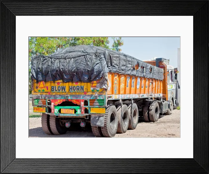 Framed Print : Colorful Indian heavy goods vehicle parked up at Dhabha (Indian truck stop) in the mid day sun Framed Print : Colorful Indian heavy goods vehicle parked up at Dhabha (Indian truck stop) in the mid day sun