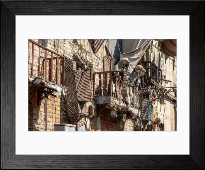Framed Print : Old Cairo Street Scene with bizarre hanging marionettes and oddments Framed Print : Old Cairo Street Scene with bizarre hanging marionettes and oddments