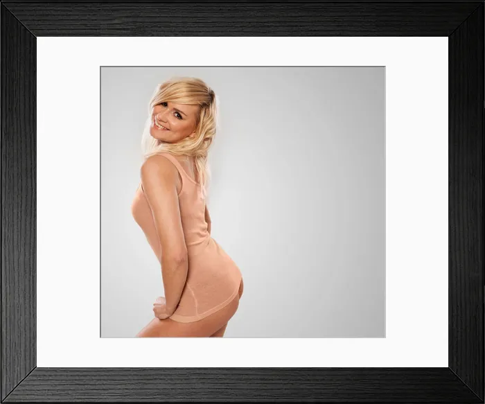 Framed Print : Cute bare butt on a shapely blonde girl wearing only a nude coloured top Framed Print : Cute bare butt on a shapely blonde girl wearing only a nude coloured top