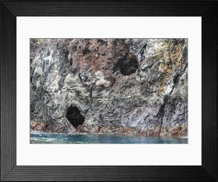 Framed Print : Sea caves eroded into the volcanic shoreline of Santiago Island in the Galapagos Islands of Ecuador Framed Print : Sea caves eroded into the volcanic shoreline of Santiago Island in the Galapagos Islands of Ecuador