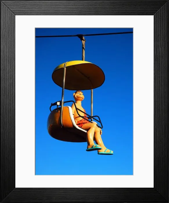Framed Print : A whimsical rider on the Sky Glider in Santa Cruz Framed Print : A whimsical rider on the Sky Glider in Santa Cruz