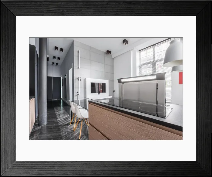 Framed Print : Apartment in industrial style and kitchen worktop with induction hob