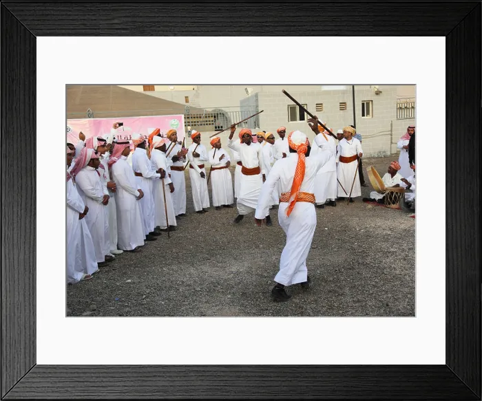 Framed Print : Men fight in traditional dress Janadriya Festival Riyadh Saudi Arabia Framed Print : Men fight in traditional dress Janadriya Festival Riyadh Saudi Arabia