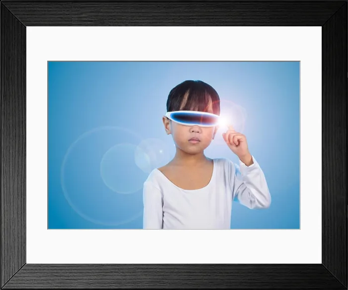Framed Print : Asian Chinese little girl wearing futuristic eyeglassses and costumes act as cyborg in isolated background Framed Print : Asian Chinese little girl wearing futuristic eyeglassses and costumes act as cyborg in isolated background