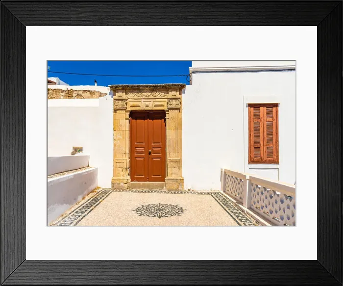 Framed Print : Greek architecture with traditional doors and decorative pavement in Lindos town, Rhodes island, Greece Framed Print : Greek architecture with traditional doors and decorative pavement in Lindos town, Rhodes island, Greece