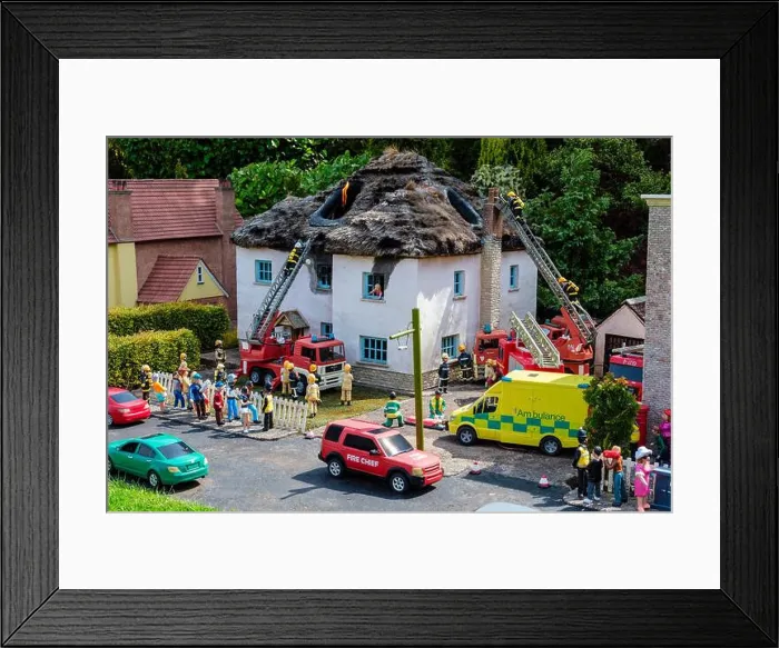 Framed Print : A thatched roof on fire at Babbacombe Model Village, Babbacombe, Torquay, Devon Framed Print : A thatched roof on fire at Babbacombe Model Village, Babbacombe, Torquay, Devon