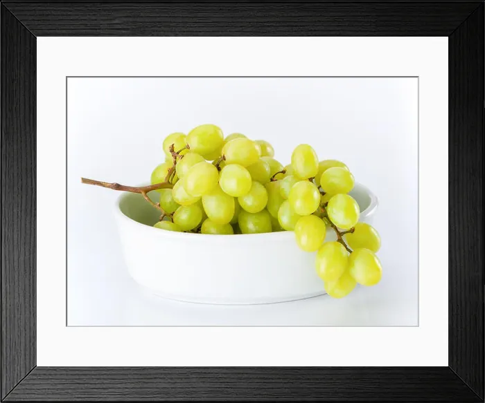 Framed Print : Fresh green grapes in white bowl on white Framed Print : Fresh green grapes in white bowl on white
