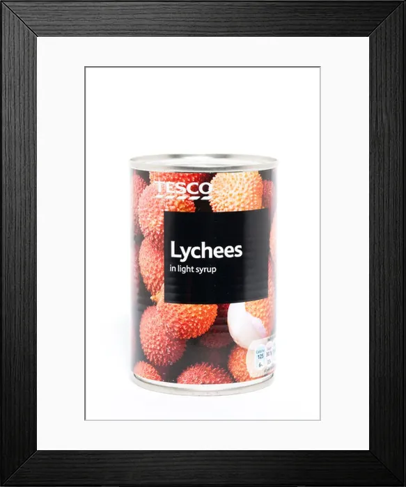 Framed Print : A tin of Tesco Lychees in light syrup on a white background