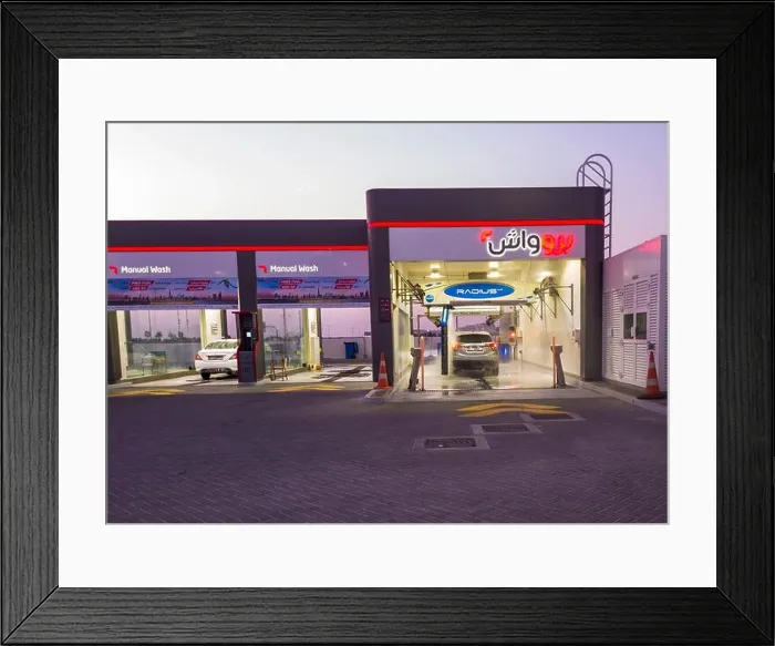Framed Print : Dubai, UAE - 10.14.2022 - Car wash facility in one of the service stations Framed Print : Dubai, UAE - 10.14.2022 - Car wash facility in one of the service stations