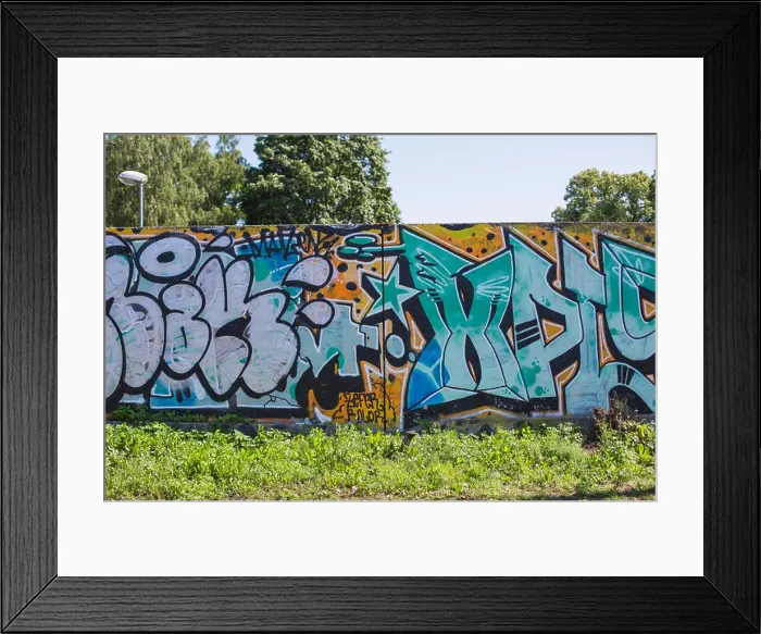 Framed Print : City Riga, Latvian Republic. Colored wall, street graffiti. 2019. 24. July. Travel photo