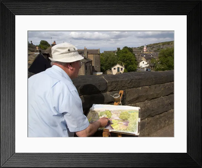 Framed Print : Artist Dez Wilson painting his local town of Marsden in the Colne Valley, West Yorkshire, UK Framed Print : Artist Dez Wilson painting his local town of Marsden in the Colne Valley, West Yorkshire, UK