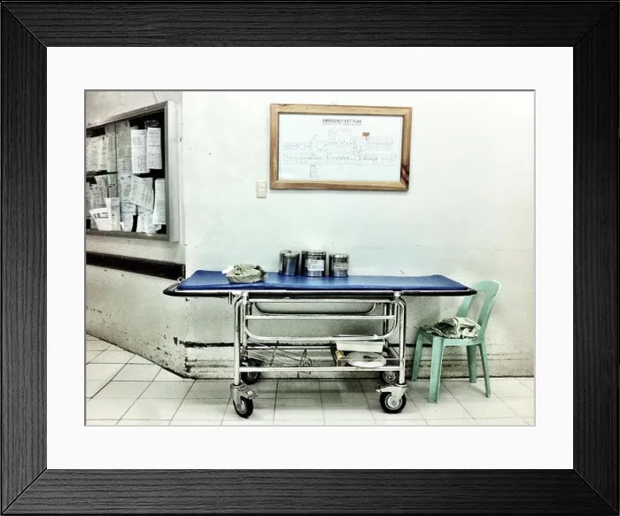 Framed Print : Old hospital bed on wheels in the hallway of the hospital in the Philippines