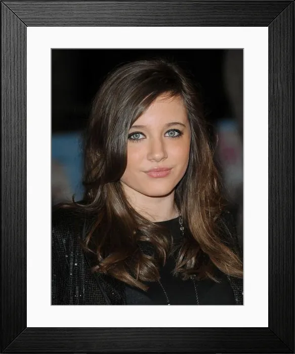 Framed Print : Madeline Duggan arriving for the UK premiere of St Trinian's 2 - The Legend of Fritton's Gold at the Empire Framed Print : Madeline Duggan arriving for the UK premiere of St Trinian's 2 - The Legend of Fritton's Gold at the Empire