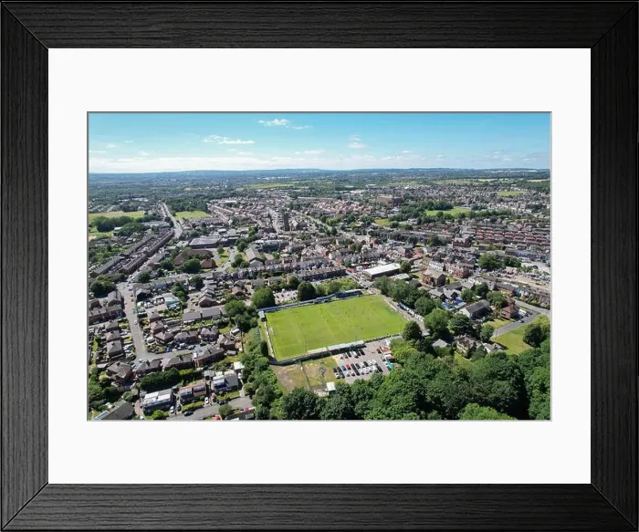 Framed Print : Aerial drone top view of football soccer field with people playing Framed Print : Aerial drone top view of football soccer field with people playing