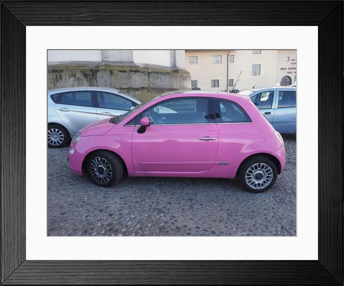 Framed Print : TURIN, ITALY - CIRCA FEBRUARY 2020: pink Fiat 500 car