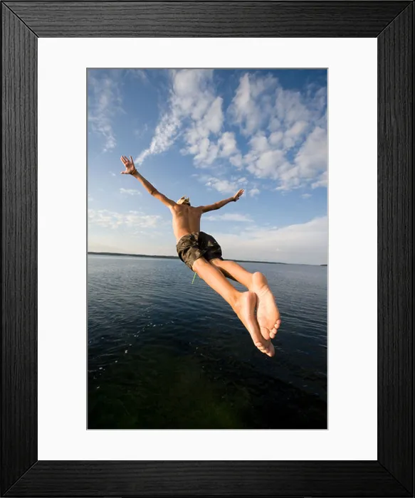 Framed Print : Boys leaping off a pier in Denmark Framed Print : Boys leaping off a pier in Denmark