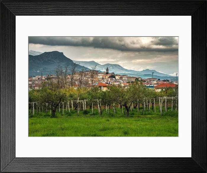 Framed Print : the town of Tocco da Casauria immersed in the countryside and in the rows of vines Framed Print : the town of Tocco da Casauria immersed in the countryside and in the rows of vines