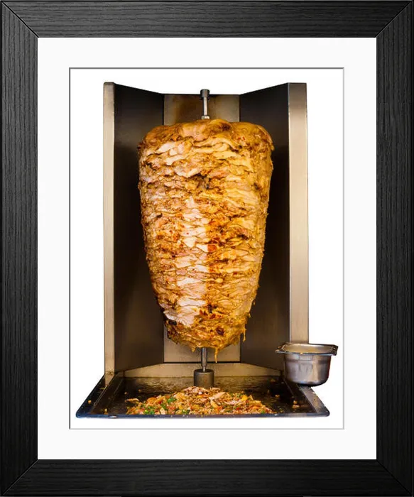 Framed Print : Grilled skewered chicken, a traditional meat served inside a shawarma sandwich in the Arab countries in Middle East Framed Print : Grilled skewered chicken, a traditional meat served inside a shawarma sandwich in the Arab countries in Middle East