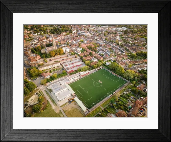 Framed Print : Dorking, Surrey, UK- Aerial view of Dorking Wanderers FC stadium