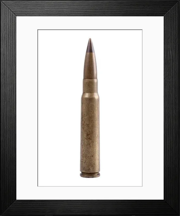 Framed Print : Machine gun bullet on a white background Framed Print : Machine gun bullet on a white background
