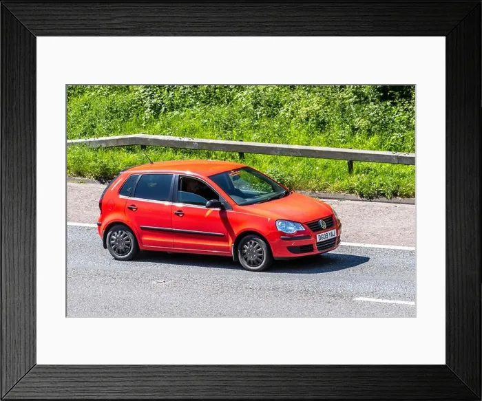 Framed Print : 2009 red Volkswagen Polo E 60; Vehicular traffic moving vehicles Framed Print : 2009 red Volkswagen Polo E 60; Vehicular traffic moving vehicles