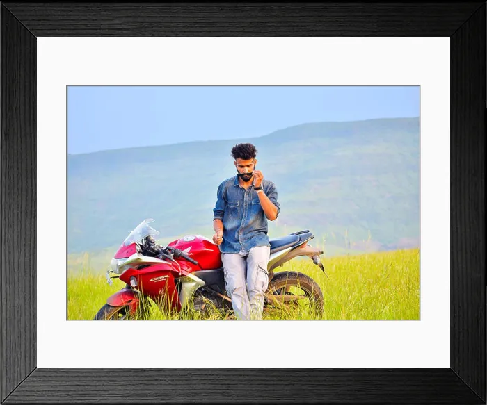 Framed Print : Indian Boy with Motor Bike and mountain background. Pune, Maharashtra Framed Print : Indian Boy with Motor Bike and mountain background. Pune, Maharashtra