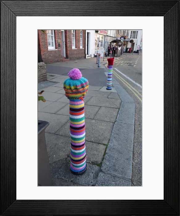 Framed Print : Colorful knitted decorations in Battle - East Sussex - United Kingdom -(also known as yarn bombing) Framed Print : Colorful knitted decorations in Battle - East Sussex - United Kingdom -(also known as yarn bombing)