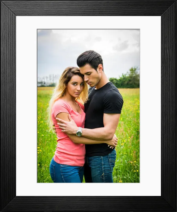 Framed Print : Boyfriend and girlfriend standing in countryside in green luscious field Framed Print : Boyfriend and girlfriend standing in countryside in green luscious field
