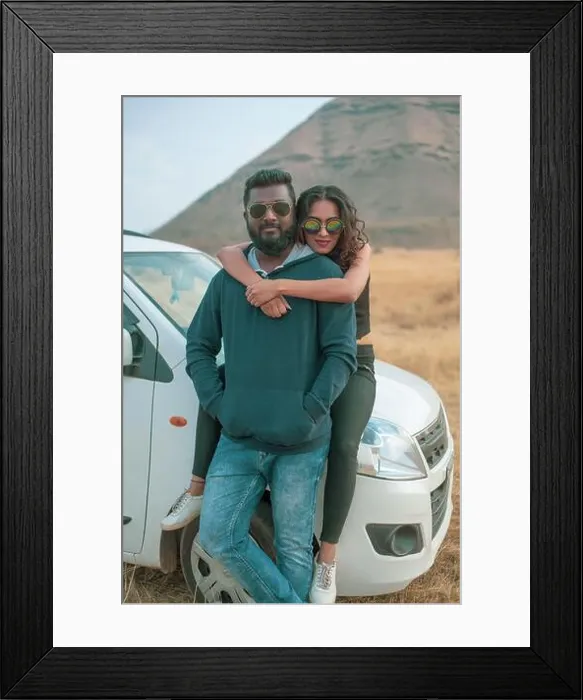 Framed Print : Vertical shot of a happy young Indian couple, girl hugging her boyfriend from behind Framed Print : Vertical shot of a happy young Indian couple, girl hugging her boyfriend from behind