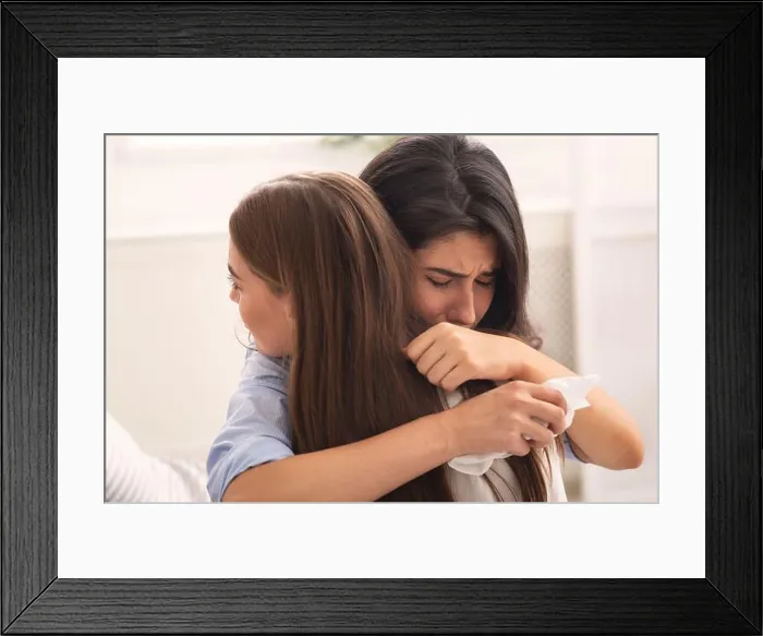 Framed Print : Girl Crying Hugging Her Compassionate Friend Sitting On Couch Indoor Framed Print : Girl Crying Hugging Her Compassionate Friend Sitting On Couch Indoor