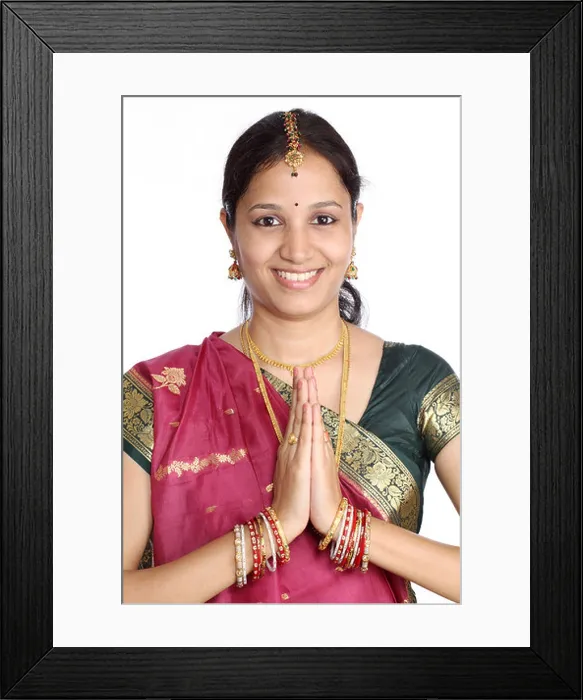 Framed Print : Traditional Indian girl holding hands in prayer position Framed Print : Traditional Indian girl holding hands in prayer position