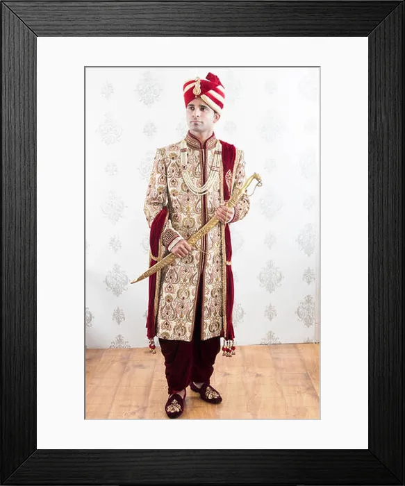 Framed Print : One groom wearing Indian Traditional sherwani with Sword wedding Ceremony Framed Print : One groom wearing Indian Traditional sherwani with Sword wedding Ceremony