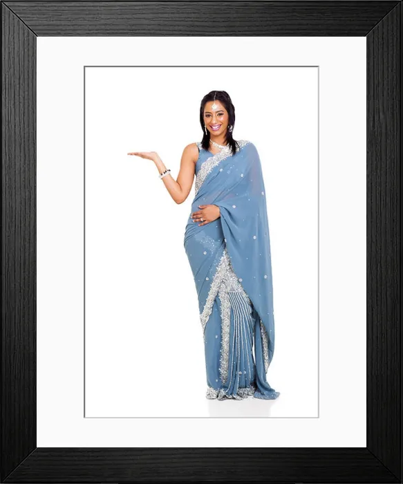 Framed Print : cheerful Indian woman wearing sari presenting isolated on white Framed Print : cheerful Indian woman wearing sari presenting isolated on white