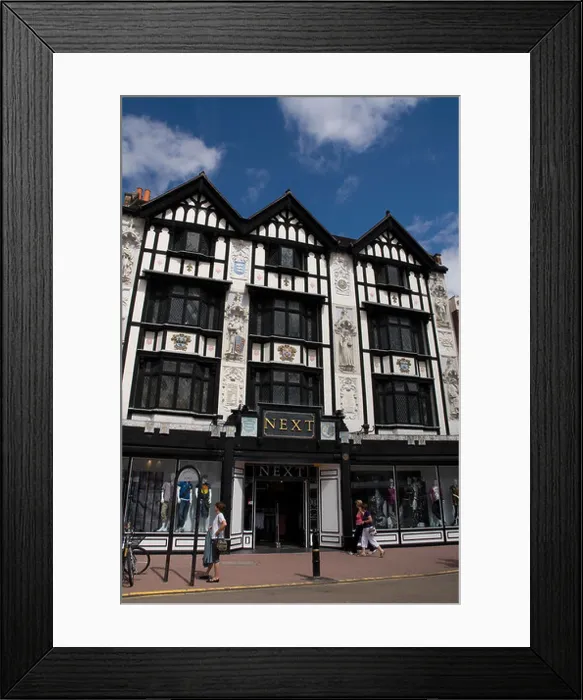 Framed Print : Next ladies clothes shop in a timber framed building Kingston Upon Thames Surrey UK Framed Print : Next ladies clothes shop in a timber framed building Kingston Upon Thames Surrey UK
