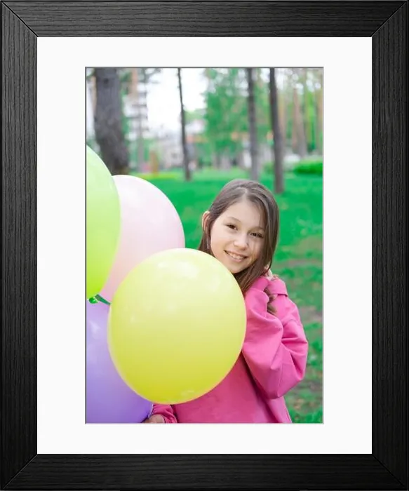 Framed Print : sweet tween brunette girl in pink holding colorful balloons outdoors. party, birthday concept. summertime. happy kids Framed Print : sweet tween brunette girl in pink holding colorful balloons outdoors. party, birthday concept. summertime. happy kids
