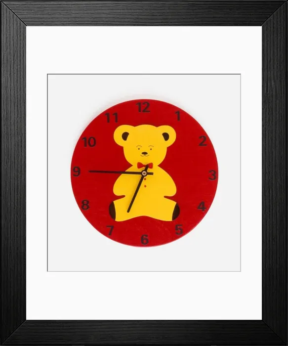 Framed Print : Red wall clock with yellow teddy on face, front view Framed Print : Red wall clock with yellow teddy on face, front view