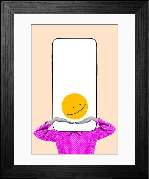 Framed Print : Screen mask. Woman with phone as head and ironic emoji displayed on screen replacing real face Framed Print : Screen mask. Woman with phone as head and ironic emoji displayed on screen replacing real face
