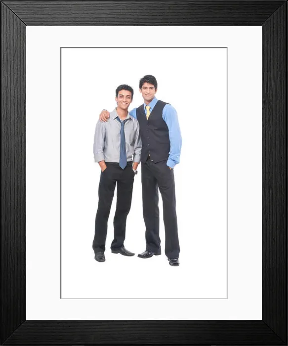 Framed Print : Two businessmen standing close, looking happy, hands on shoulder Framed Print : Two businessmen standing close, looking happy, hands on shoulder