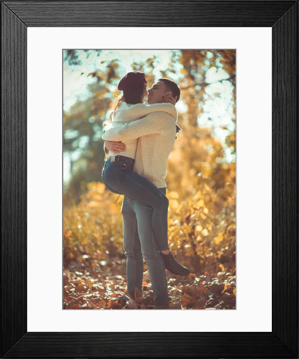 Framed Print : Sweet couple is in the park, hugging and looking very happy, enjoying the sunny day Framed Print : Sweet couple is in the park, hugging and looking very happy, enjoying the sunny day