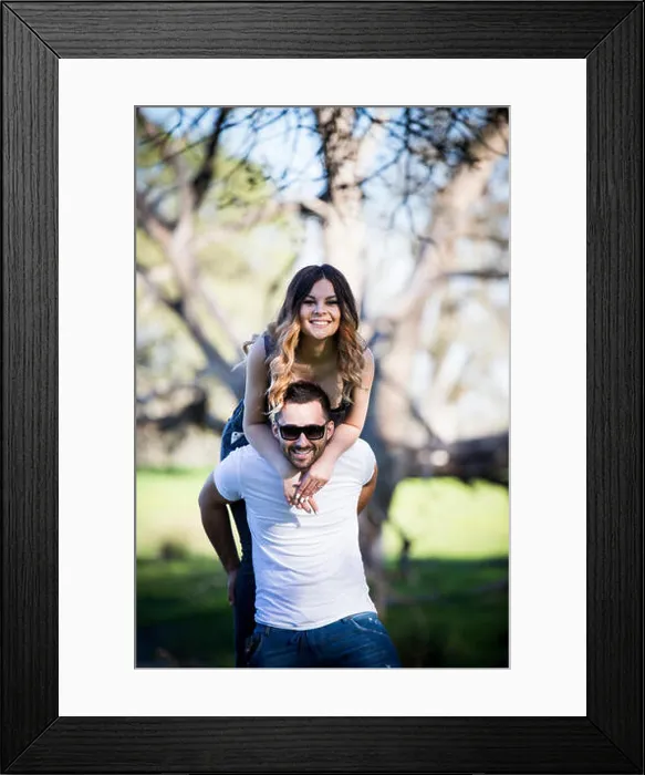 Framed Print : Romantic couple girlfriend and boyfriend having fun outdoor summer park Framed Print : Romantic couple girlfriend and boyfriend having fun outdoor summer park