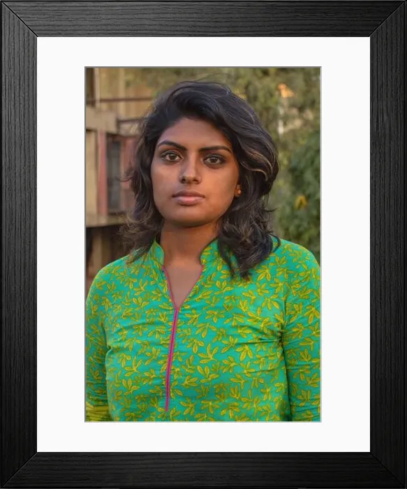 Framed Print : A indian girl poses for portfolio shoot at outside of studio