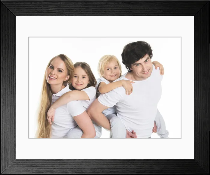 Framed Print : Studio portrait of family in white clothes with two children isolated on white background Framed Print : Studio portrait of family in white clothes with two children isolated on white background