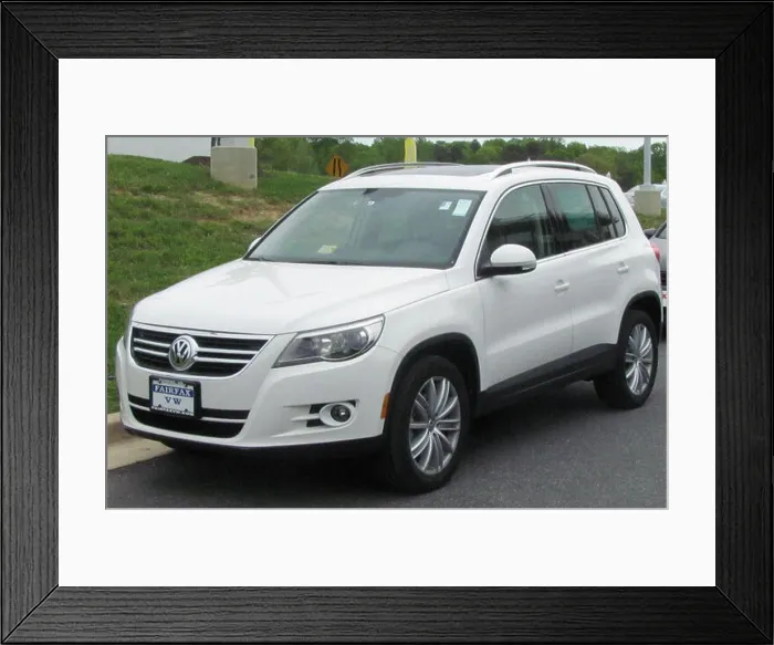 Framed Print : The 2010 Volkswagen Tiguan is a compact crossover SUV that blends European design with practicality Framed Print : The 2010 Volkswagen Tiguan is a compact crossover SUV that blends European design with practicality