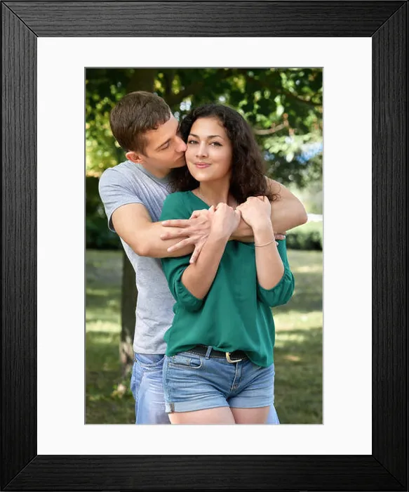 Framed Print : Romantic couple posing in city park, summer season, lovers boy and girl Framed Print : Romantic couple posing in city park, summer season, lovers boy and girl